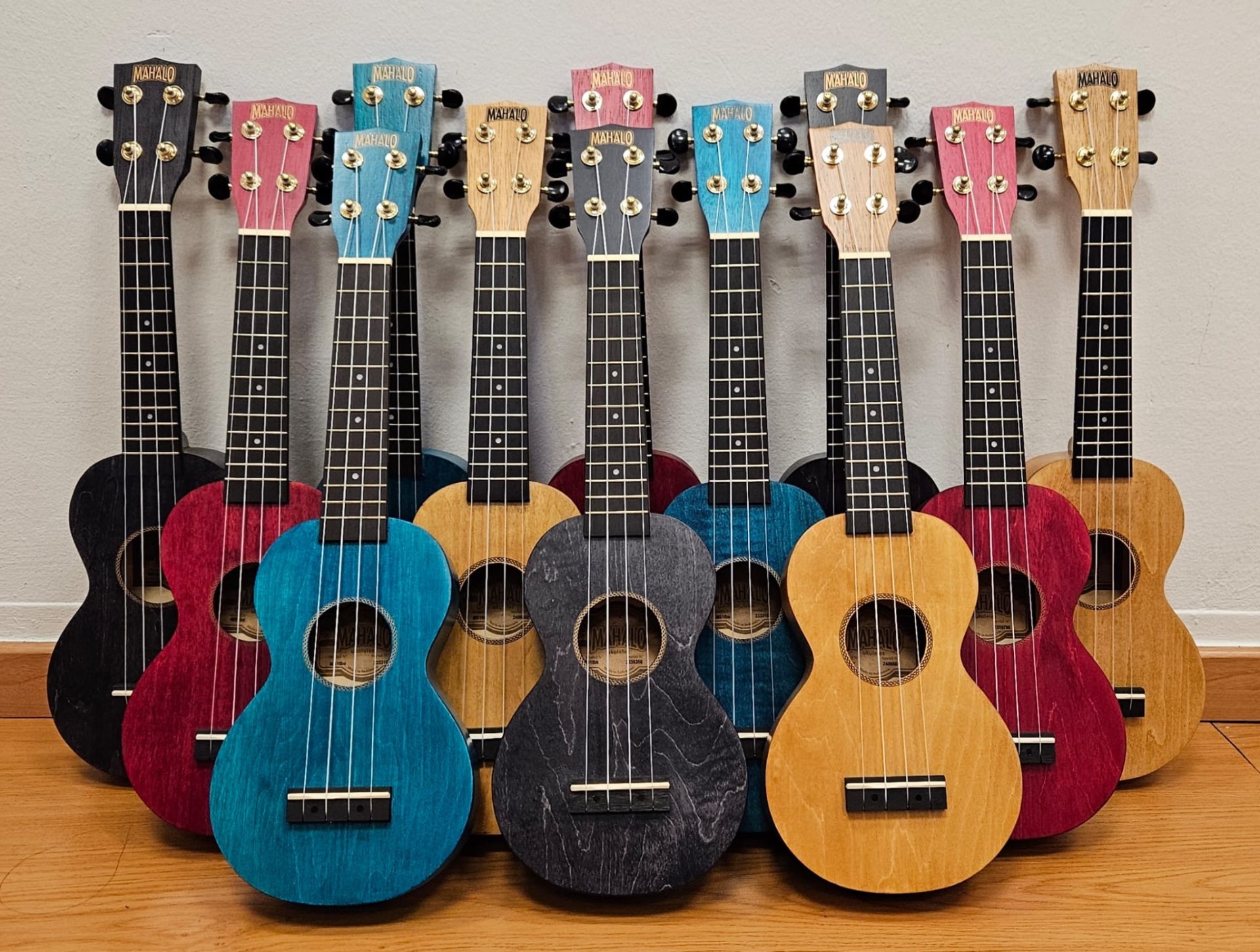 Lineup of colourful Mahalo ukuleles students receive at S'Chorus Music Singapore